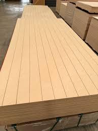 Large heavy-duty plywood panels stacked in a warehouse